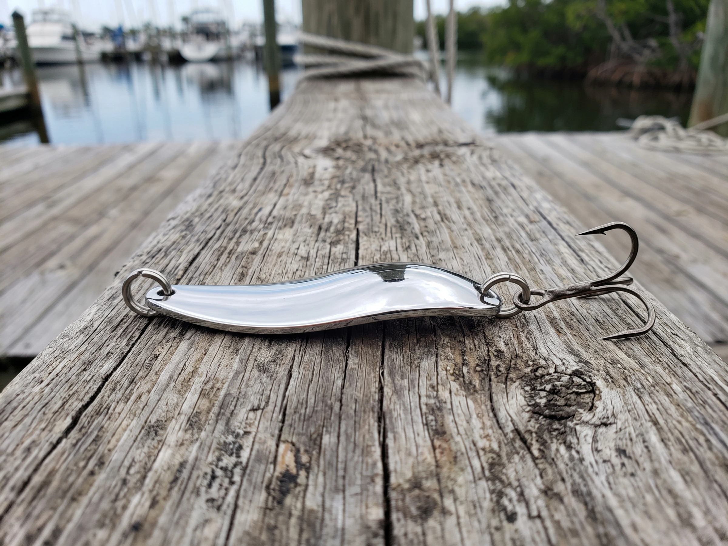 Saltwater casting spoon on a dock